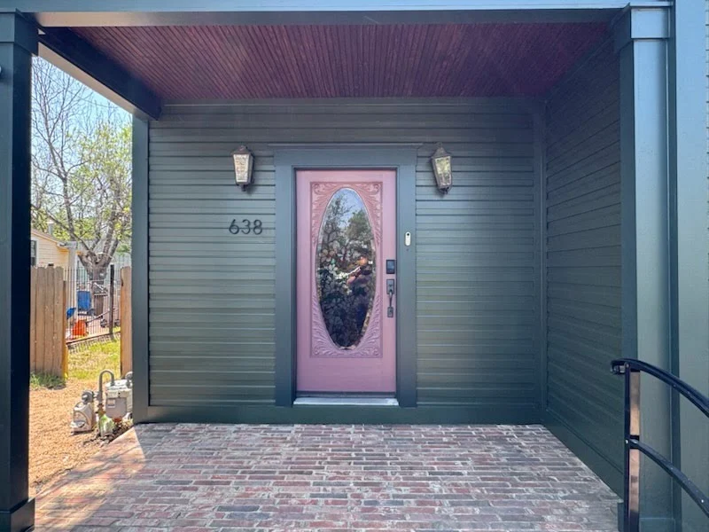 Interior entryway and staircase with crisp white paint finish
